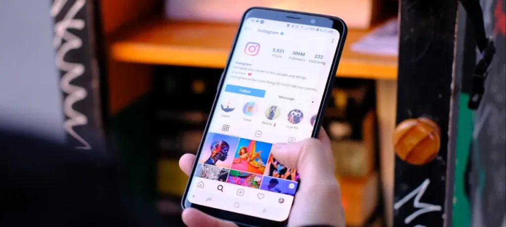 what is Instagram SEO? hand holding phone with instagram app open