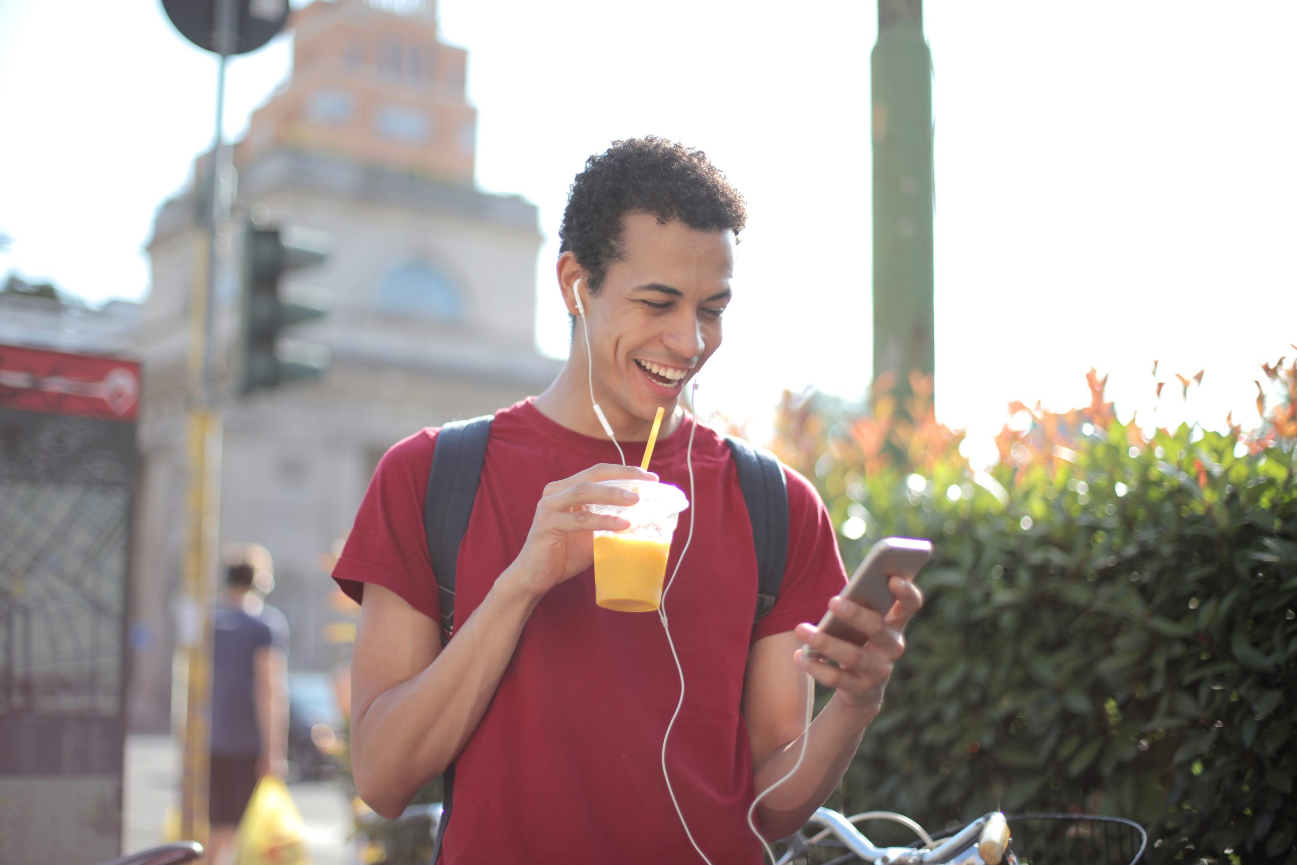 Best Practices of SMS Marketing : Smiling while opening a text